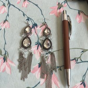 Long silvery white earrings. Not real but very pretty. Used but good condition!